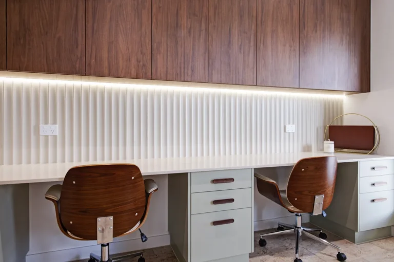 Modern home office with wooden chairs and cabinets