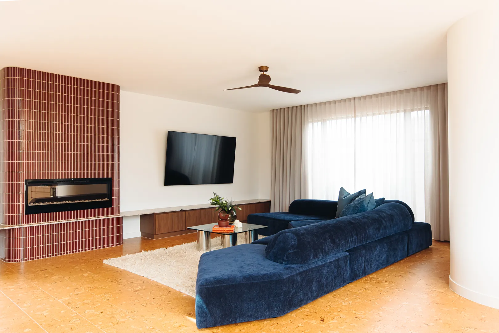 Modern living room with fireplace and TV